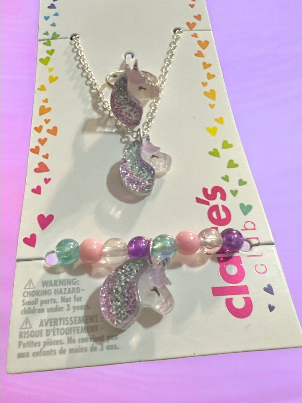 Claire's Purple Glitter Unicorn Necklace, ring & Pastel Bead Bracelet Set
1074